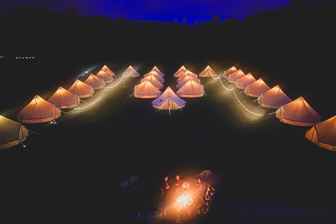 Luxury bell tent village by Bellorama for a boutique festival in the South West.